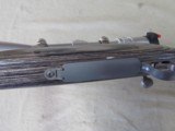 REMINGTON 700 STAINLESS LAMINATED 7MM REM ULTRA MAGNUM BOLT ACTION RIFLE & BAUSCH & LOMB ELITE 4200 SCOPE RUM - 13 of 13