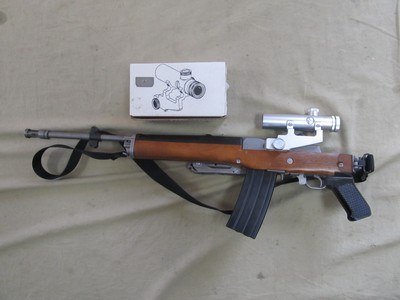 VINTAGE FIRE POWER ERA CORRECT YEAR 2000 RUGER MINI 14 ERA CORRECT SCOPED 223 CALIBER FOLDING SEMI AUTO CARBINE