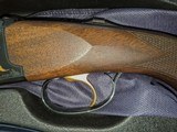 SLX600 Combo Series Shotgun. This A Beautiful Gun. Will Not DisappointTwo Barrels one 20/Gauge and one 28 Gauge - 4 of 5