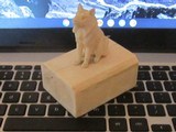 A WonderfulEskimo HandCarved IvoryHuskieSled Dog on a Walrus Tush pedestal4 X 3 by 2 1/4 inch - 1 of 5
