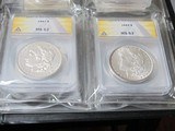 Nice StartingCollecrion ofUncirculated 90 percent Silver Dollars8 total in binder. MS 61, Ms 62, MS 63 - 1 of 7
