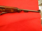 We have a CMP certified M1 Carbine with extra mags and a bandolier of ammo - 6 of 8