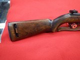 We have a CMP certified M1 Carbine with extra mags and a bandolier of ammo - 4 of 8