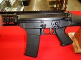 SIG SAUER 556 SWAT PRE-OWNED RIFLE IN 5.56 NATO CALIBER - 1 of 9