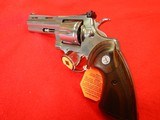 COLT PYTHON NIB 4" BRIGHT STAINLESS STEEL 6-SHOT .357 MAGNUM - 4 of 9