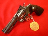 COLT PYTHON NIB 4" BRIGHT STAINLESS STEEL 6-SHOT .357 MAGNUM - 3 of 9