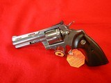 COLT PYTHON NIB 4" BRIGHT STAINLESS STEEL 6-SHOT .357 MAGNUM - 1 of 9