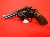 SMITH AND WESSON K38 PRE-OWNED BLUE STEEL REVOLVER - 1 of 8