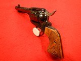 RUGER PRE-OWNED UNFIRED ENGRAVED BLUE JOHN WAYNE COMMEMORATIVE VAQUERO .45 COLT - 2 of 11