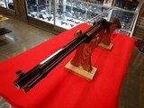 HENRY PRE-OWNED PUMP-ACTION RIMFIRE RIFLE .22 WMR - 1 of 13