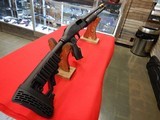 MOSSBERG 590 PERSUADER PUMP ACTION 12 GA