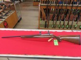 Ruger 77/17, 17 HMR, Blued, Walnut checkered stock. - 1 of 2