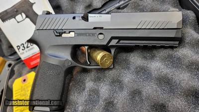 SIG SAUER P320 ROCKY MOUNTIN ELK FOUNDATION FULL SIZE 9MM LIKE NEW 17+1 CAP.