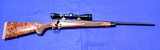 Winchester Model 70 Super Grade 30-06 with Leupold VX-2 - 1 of 15
