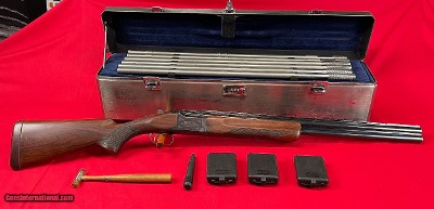 Browning Grade 1 Citori 12ga w/
Briley subgauge tubes 20ga, 28ga, 410 bore