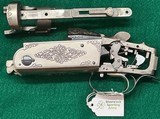 KRIEGHOFF K80 RECEIVER AND IRON GOLD BROKEN CLAY TRIGGER GUARD & GOLD BROKEN CLAY TOP LATCH