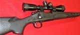 Remington 700 SPS Varmint Bushnell 10X Scope .308 WIN - 1 of 14