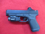 Glock Model 49 MOS, 9mm., Green Dot, Stream Light, Box etc. AS NEW