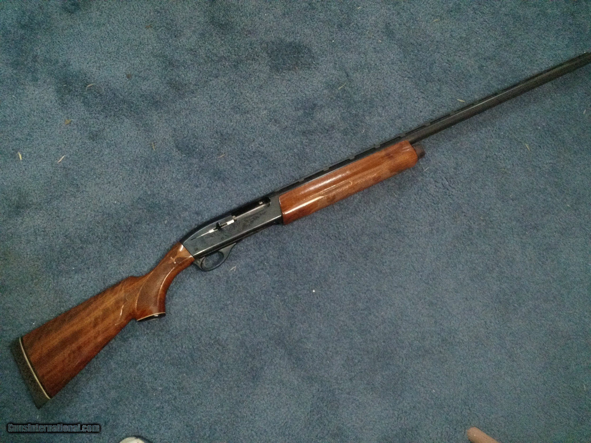 remington 1100 serial number location