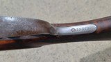 HIGH CONDITION LEFEVER F GRADE 12 GAUGE WITH DAMASCUS BARRELS.
MADE IN
1893.
ANTIQUE!
CAN SHIP TO YOUR DOOR! - 9 of 14