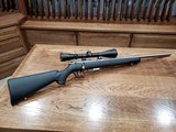 Savage 93R17 17 HMR Rifle Stainless w/ Varmint Barrel & Leupold VX-1 - 2 of 11