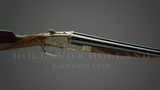Holland & Holland 12 gauge 'Royal' Deluxe Model Sidelock Ejector Shotgun with self opening with double triggers and automatic safety - 1 of 3