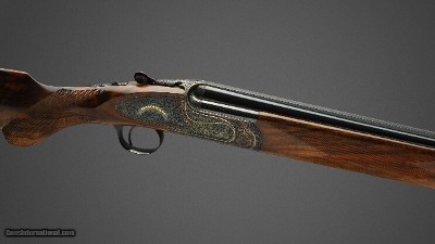Holland & Holland pair of 12 gauge
'Sporting Deluxe' Over-and-Under shotguns with 28 inch barrels