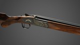 Holland & Holland pair of 12 gauge'Sporting Deluxe' Over-and-Under shotguns with 28 inch barrels