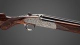 Holland & Holland pair of 20 gauge 'Sporting Deluxe' Over-and-Under shotguns with 29 inch barrels.