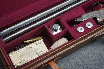 Stunning Holland & Holland Model Deluxe SXS 12 GA. With 30