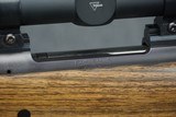 AS NEW, ONLY FIRED TO SIGHT IN SCOPE - DAKOTA ARMS MODEL 76 RIFLE CHAMBERED IN 416 RIGBY WITH TRIJICON 1-4X24 SCOPE! RIFLE IS AS NEW. - 11 of 12