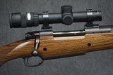 AS NEW, ONLY FIRED TO SIGHT IN SCOPE - DAKOTA ARMS MODEL 76 RIFLE CHAMBERED IN 416 RIGBY WITH TRIJICON 1-4X24 SCOPE! RIFLE IS AS NEW. - 3 of 12
