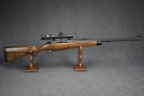 AS NEW, ONLY FIRED TO SIGHT IN SCOPE - DAKOTA ARMS MODEL 76 RIFLE CHAMBERED IN 416 RIGBY WITH TRIJICON 1-4X24 SCOPE! RIFLE IS AS NEW. - 1 of 12
