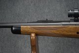AS NEW, ONLY FIRED TO SIGHT IN SCOPE - DAKOTA ARMS MODEL 76 RIFLE CHAMBERED IN 416 RIGBY WITH TRIJICON 1-4X24 SCOPE! RIFLE IS AS NEW. - 9 of 12
