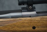 AS NEW, ONLY FIRED TO SIGHT IN SCOPE - DAKOTA ARMS MODEL 76 RIFLE CHAMBERED IN 416 RIGBY WITH TRIJICON 1-4X24 SCOPE! RIFLE IS AS NEW. - 10 of 12