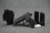 Sig Sauer P365 TACPAC 9mm 3.1" Barrel - 1 of 3