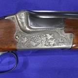 Merkel 201eBoxlock with deep animal engraving from 1978 no import markings. 12/7028in - 14 of 15