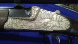 Price Reduced - Krieghoff Ulm Sidelock Double Rifle in 9,3X74R from 1990, Deep Animal Engraving. - 8 of 15