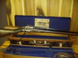 Williams & Powell rifle and shotgun set - 1 of 4