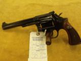 Smith & Wesson, 14-3
K-38 Masterpiece, .38 S&W Special, 6