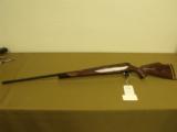 Weatherby, Mark V
Deluxe ", .378 Wby. Mag., 28" bbl w/ muzzle break ", 8 Lbs. 4 oz., 13 1/2" L/O.P. - 6 of 10