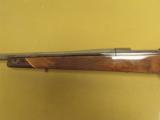 Weatherby, Mark V
Deluxe ", .378 Wby. Mag., 28" bbl w/ muzzle break ", 8 Lbs. 4 oz., 13 1/2" L/O.P. - 9 of 10