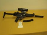 H&K/Walther, MP5, .22 Long Rifle, 16" bbl., 9 lb. 9 oz.,12 1/2" L.O.P., fake suppressor. - 1 of 9