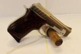 Taurus PT-22 Nickle and rosewood .22 Long rifle - 2 of 4