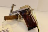 Taurus PT-22 Nickle and rosewood .22 Long rifle - 4 of 4