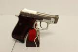 Taurus PT-22 Nickle and Rosewood .22LR - 2 of 2
