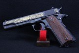 Colt 1911 John Browning Commemorative .45 auto - 1 of 6