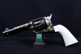Colt,Single Action Army w/long ( Target) Ivory Grips, .45 Colt, 4 3/4" bbl.,40 oz.,Mfg. 1987,After Market Engraving by V. Graham - 1 of 10