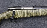 Weatherby Vanguard in 6.5 Creedmore caliber with Camo Stock - 1 of 8