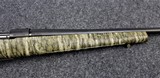 Weatherby Vanguard in 6.5 Creedmore caliber with Camo Stock - 2 of 8